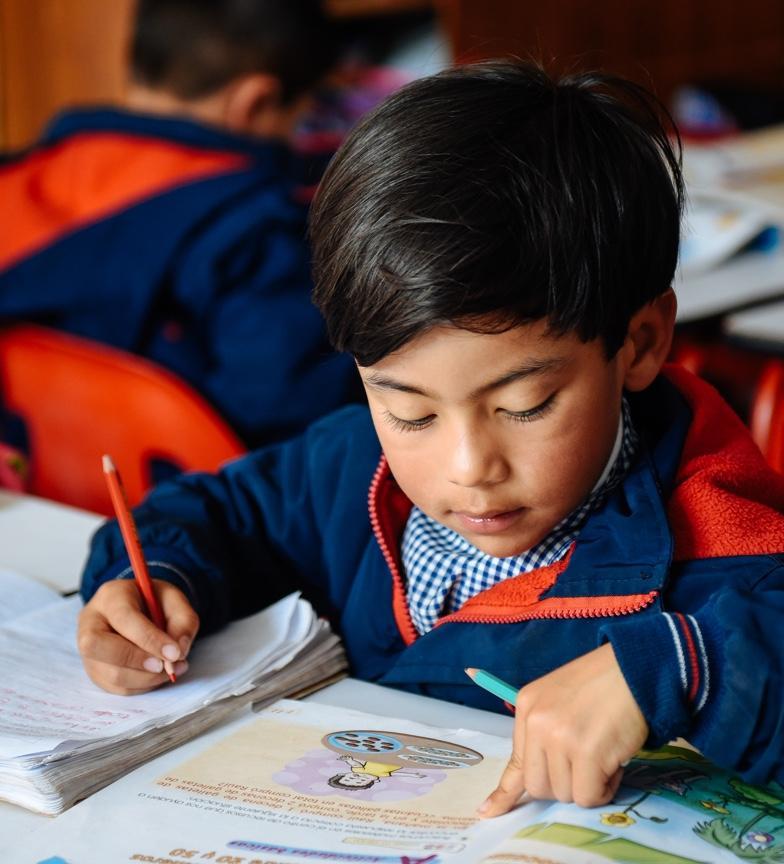 boy doing schoolwork